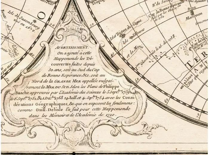 Detail at full size: the printed Avertissement between the hemispheres